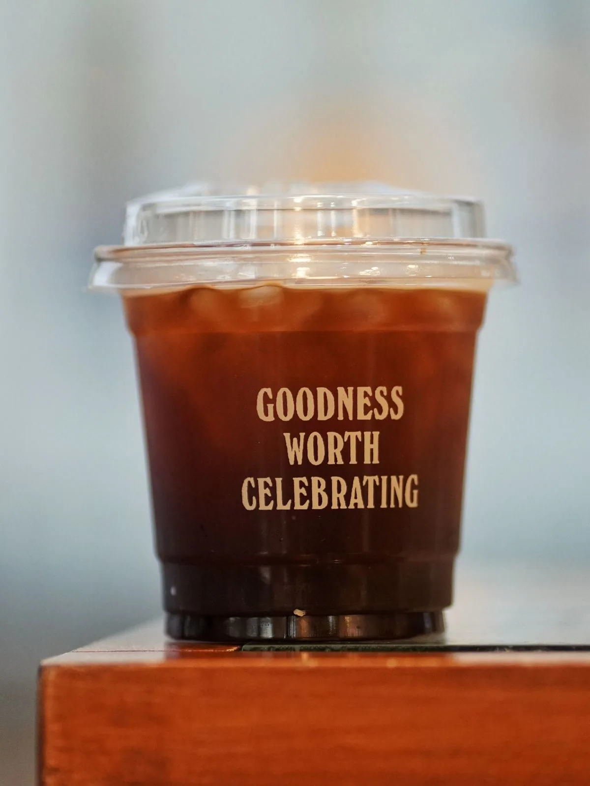 Iced coffee cup ready for sweet cream cold foam topping