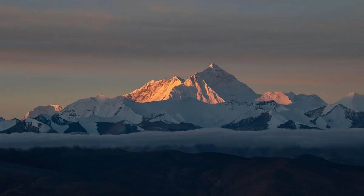 Sunrise light on Mount Everest snow showing where is everest height measured at 8848 meters
